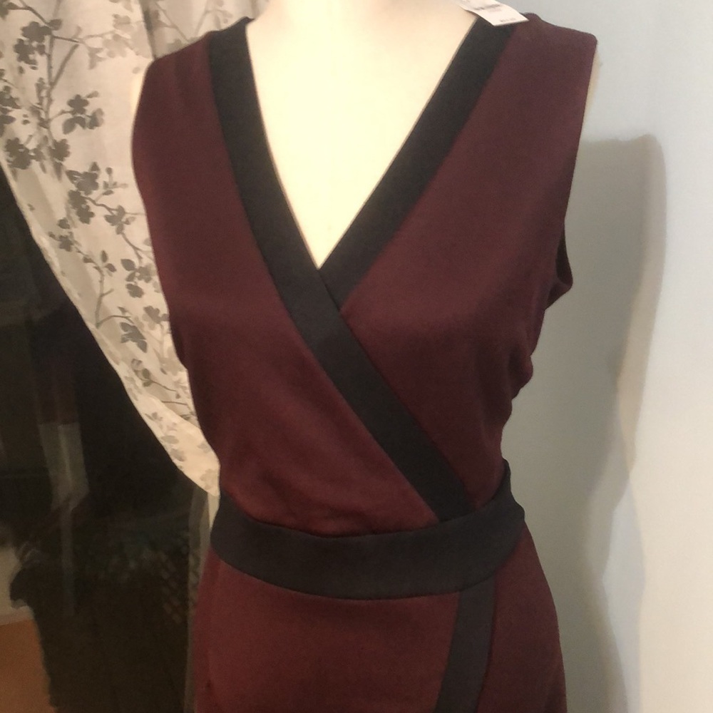 Lovely sleeveless burgundy with black trim dress